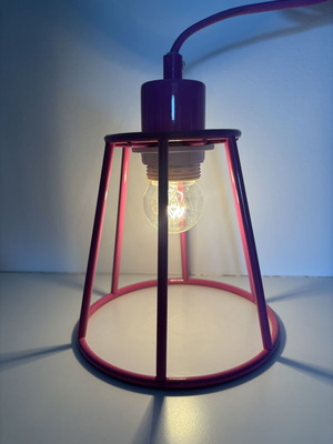 Metal ceiling pendant light in industrial cage style, fuchsia pink