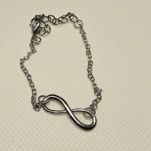 Hoop earrings and infinity bracelet like new, silver