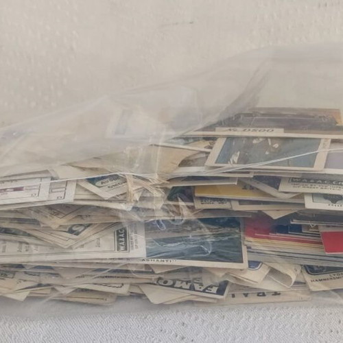 Large collection of cards, movies, sports used