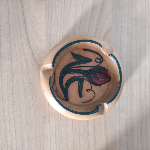 Vintage handmade ceramic ashtray in earthy colors with flower motif like new