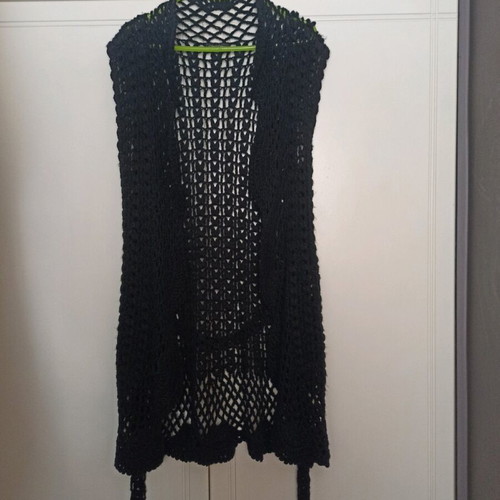 Knitted openwork kazaka in black color like new, size medium - large