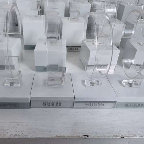 Guess 26 bases for bracelets or watches, like new, display stands set