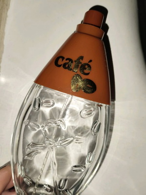 Café perfume bottle used with embossed coffee beans