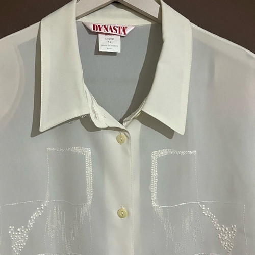 Set of 2 pieces: short sleeve shirt and top size Xlarge, very good condition, creamy white