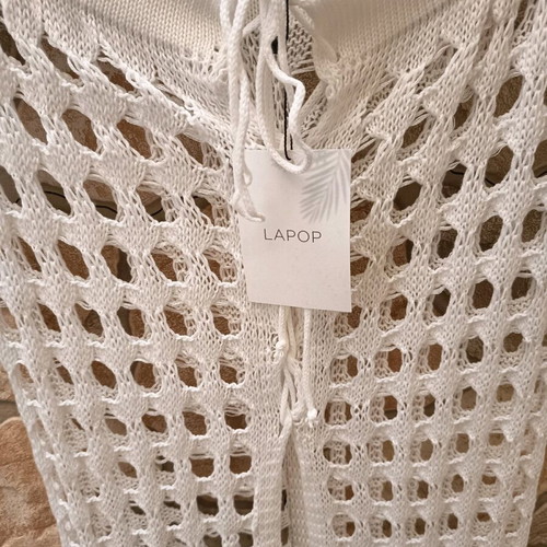 Beach skirt new, one size, white with fringes