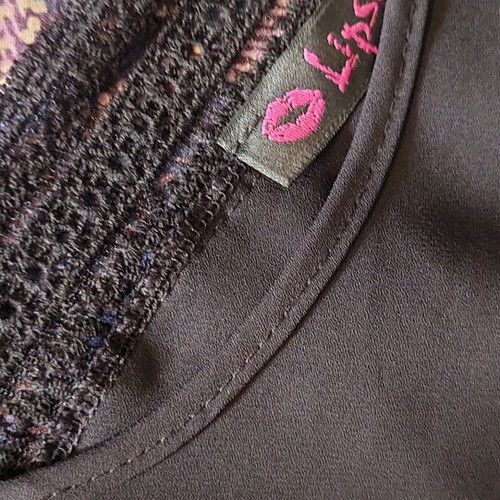 Lipsy black top with lace back used, size M