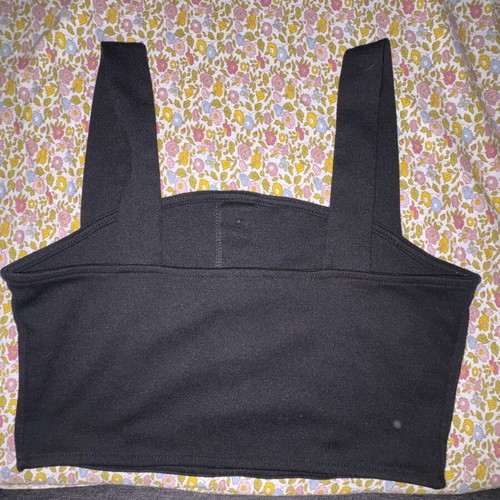 Black sleeveless shirt used with buttons, size M