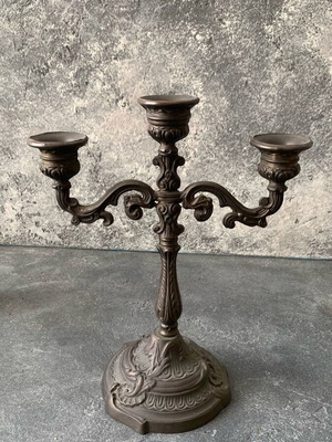 Metal candlestick used, old