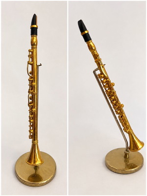 Miniature decorative clarinet with stand and case, like new