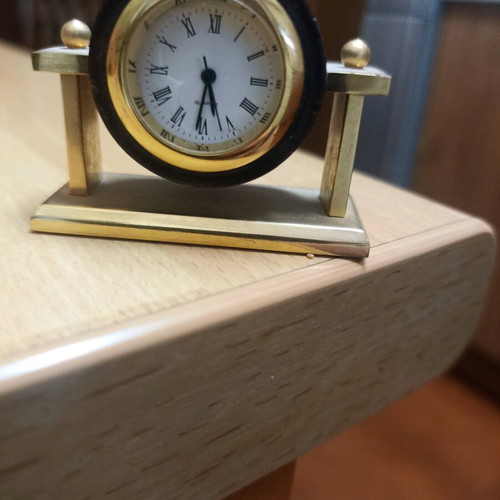Vintage quartz table clock like new with Roman numerals, wood and gold color