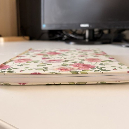 Agenda notebook with hard cover, missing some pages