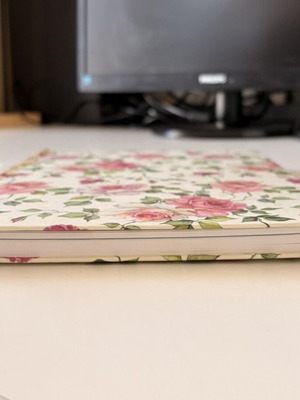 Agenda notebook with hard cover, missing some pages