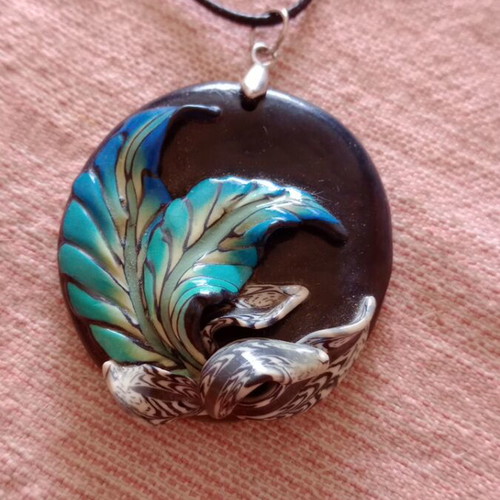 Necklace made of polymer clay and cord like new