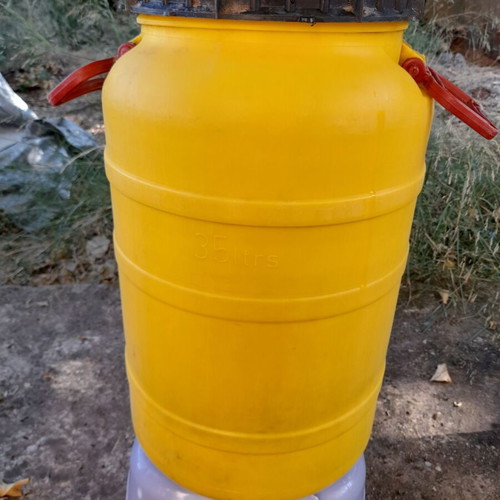 Plastic barrels for food storage, 35L yellow and 60L orange