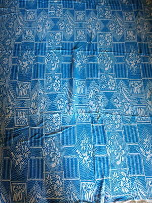 Quilt used with decorative floral and geometric patterns