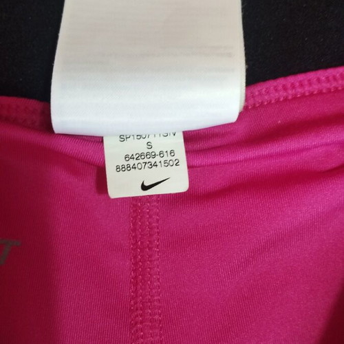 Nike women's shorts with built-in leggings like new, pink, size S