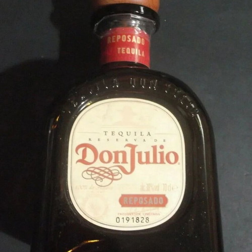 Don Julio Reposado Amber empty tequila bottle 750 ml glass with Greek text used