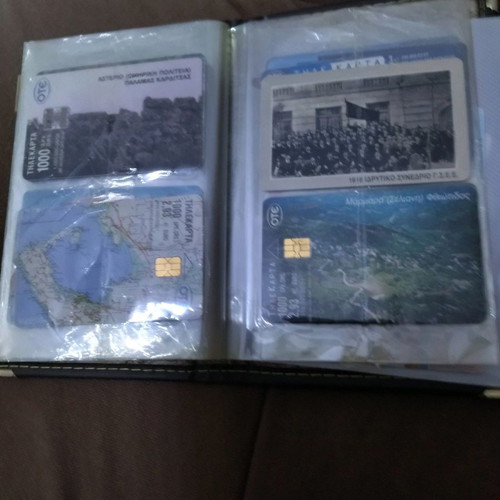 Collectible phone cards used with album