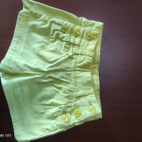 Benetton shorts for girl yellow like new, size 1-2 years