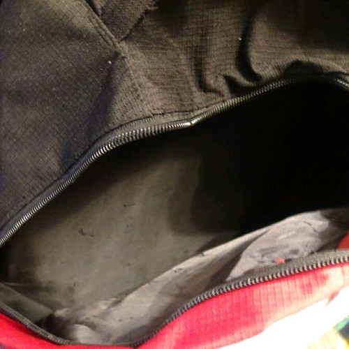 School bag used, red with multiple compartments