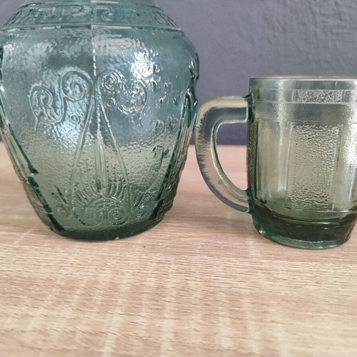 Vintage glass carafe with wine glass used