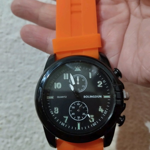 Watch orange with plastic strap like new