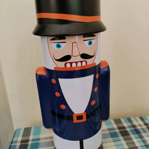Tin Nutcracker box used with small dent