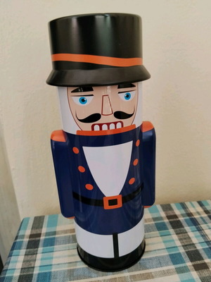 Tin Nutcracker box used with small dent