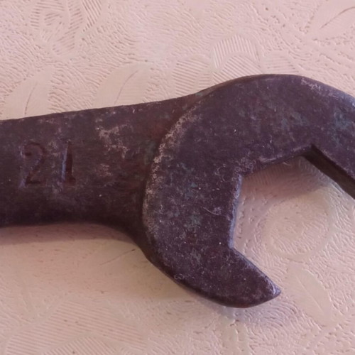 Old wrench with worn numbers and codes used