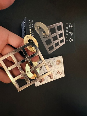 Huzzle Cast Duet metal puzzle Level 3 Hanayama brain teaser