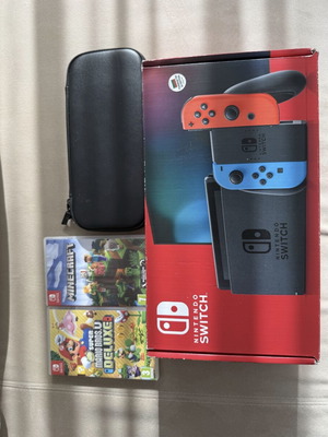 Nintendo Switch конзола като ново с Minecraft и Super Mario Deluxe