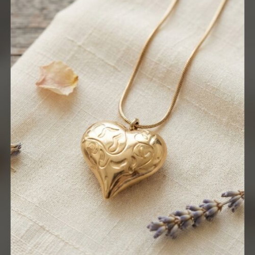 Heart and Bow Necklace like new, gold plated