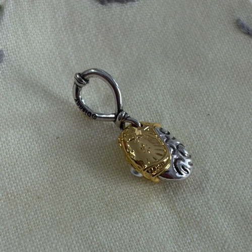 Pandora Te Fiti heart charm pendant, gold and silver