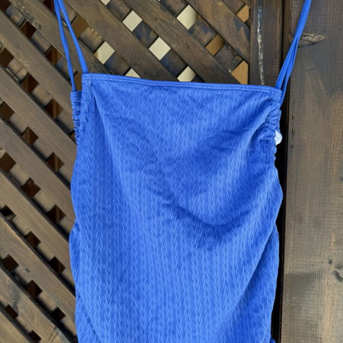 Blue swimsuit like new with adjustable side cords, draped bust, regular cut