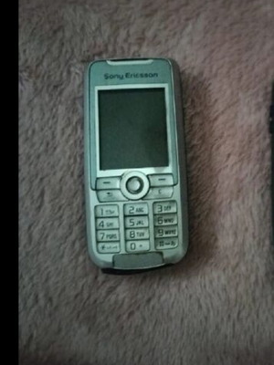Old mobile phone used, no charger, unknown if working