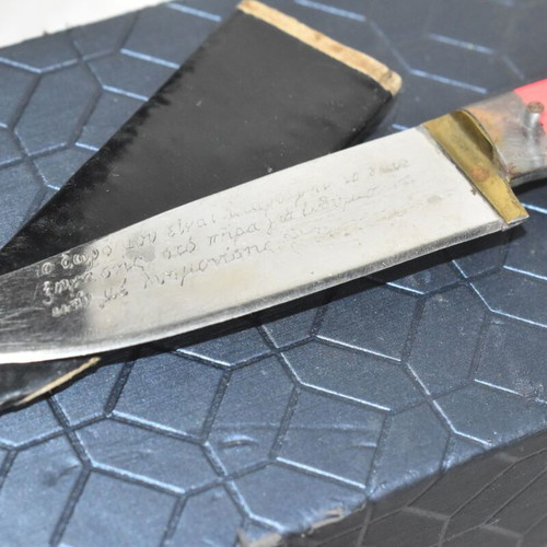 Traditional Cretan Knife with Mantinada and Decorative Handle used
