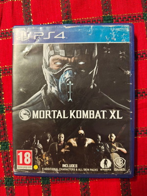 Mortal Kombat XL PS4 μεταχειρισμένο με γρατζουνισμένο cd και χτυπημένη θήκη