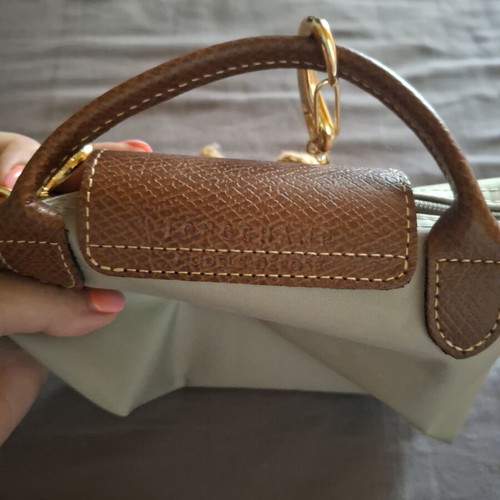 Longchamp handbag like new, gray with bag charm