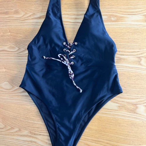 Black one-piece swimsuit with animal print cord, size L, like new