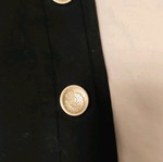 Mini black skirt with gold buttons and crown design, like new, size Large Anel