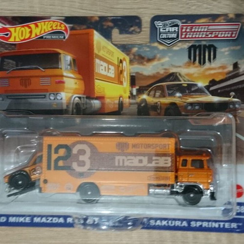 Mattel Hot Wheels Team Transport Mad Mike Mazda RX3 GT Sakura Sprinter new