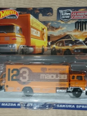 Mattel Hot Wheels Team Transport Mad Mike Mazda RX3 GT Sakura Sprinter new