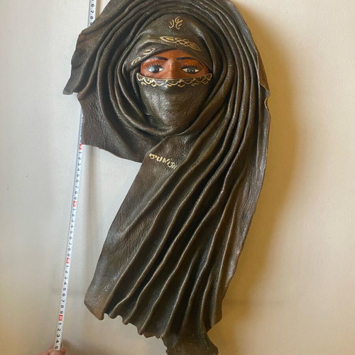 Leather wall mask like new, female face from Tunisia