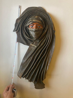 Leather wall mask like new, female face from Tunisia