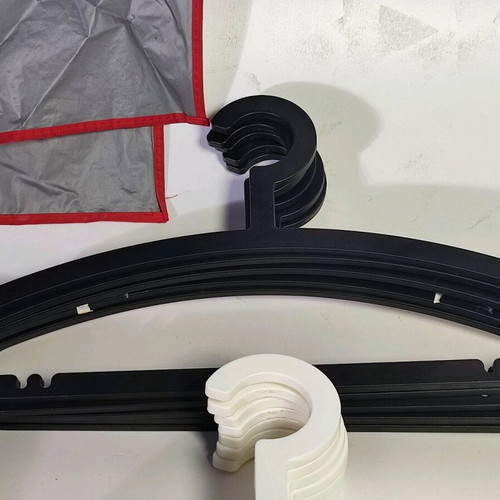 Set of 20 hangers and protective bags like new