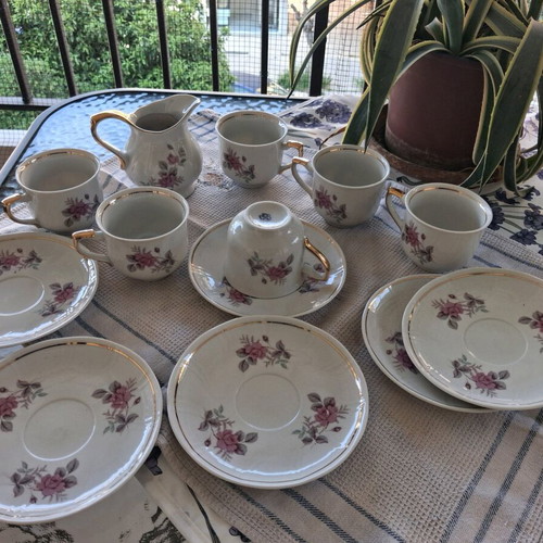 Tea cup set with pink roses and gold trim, brand new