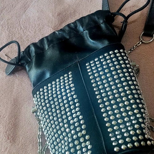 Shoulder bag like new, small black with shiny silver ornaments