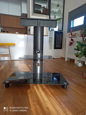 Glass TV stand used with base