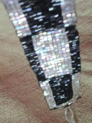 Bracelet with iridescent white and black glass beads, new