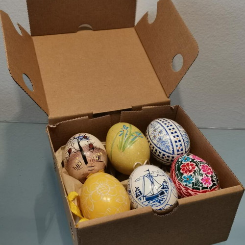 Collection of six used handmade eggs with painting and carvings